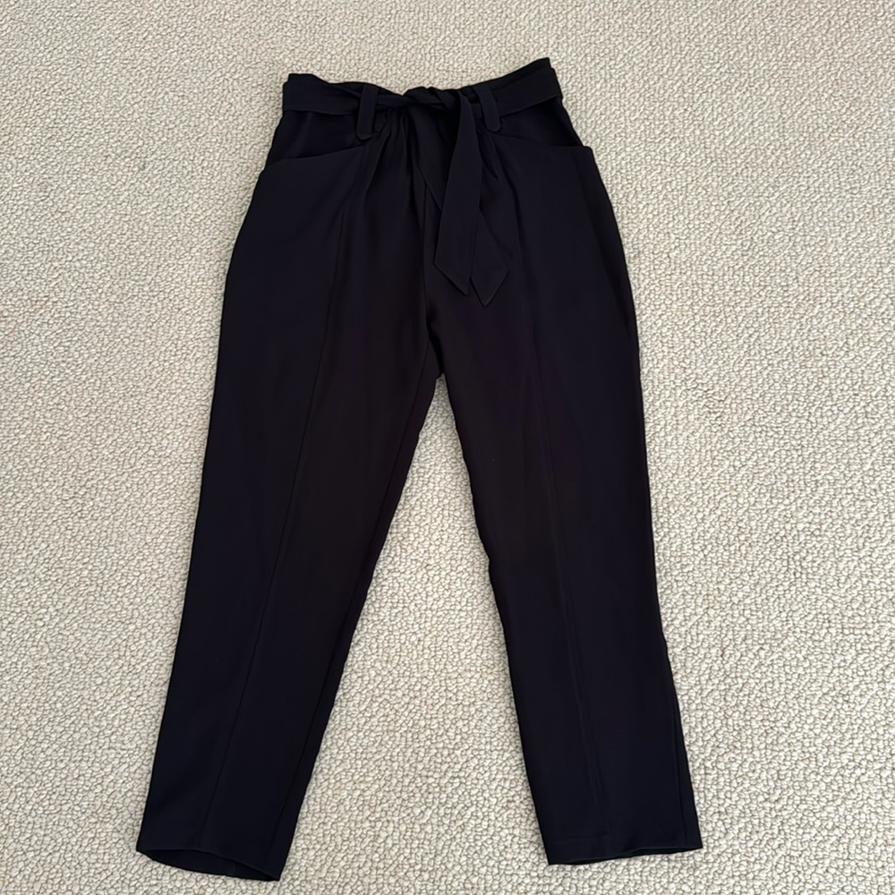 Black pants with front belt tie & pockets.  Size small.